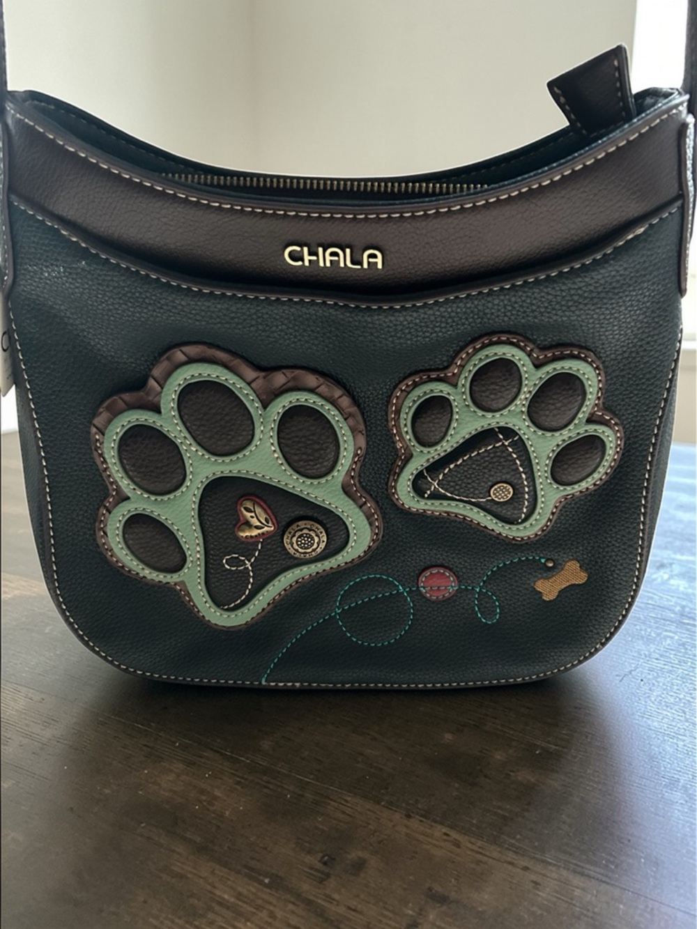 Chala Black Shoulder Bag with Mint Paw Appliqués